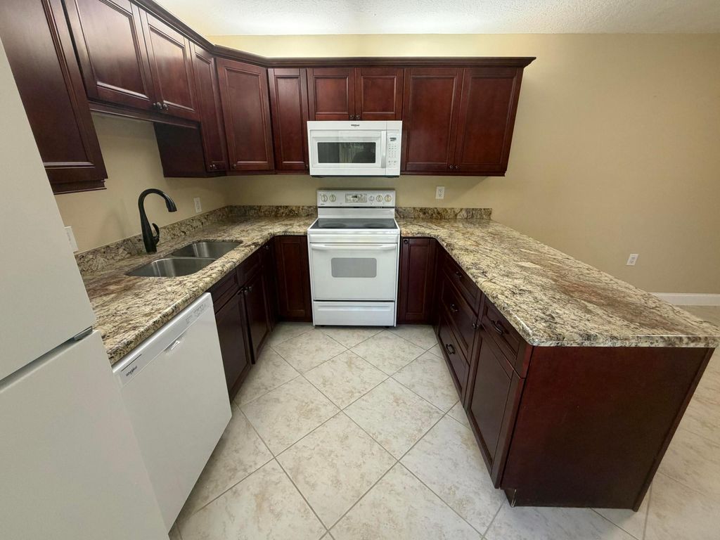 Photo of 2407 24th Lane, Palm Beach Gardens, FL 33418 (MLS # B26026031)