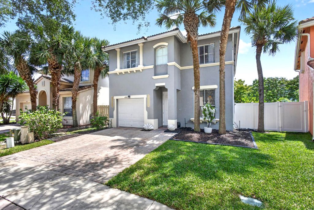 Photo of 4090 Winnipeg Way, West Palm Beach, FL 33409 (MLS # B26014798)