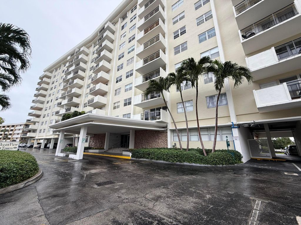 Photo of 401 Golden Isles Drive, Hallandale Beach, FL 33009 (MLS # B26010477)
