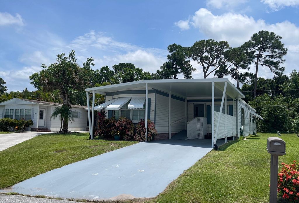 Photo of 15 SE La Mesa, Port Saint Lucie, FL 34952 (MLS # R10947195)