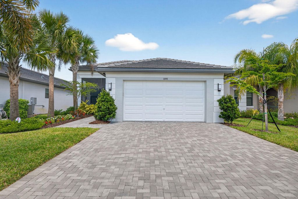 Photo of 11593 SW Marine Way, Port Saint Lucie, FL 34987 (MLS # B26007567)