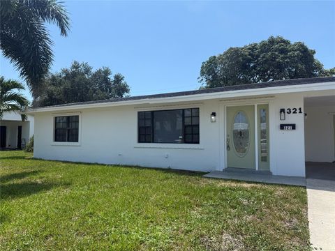 Photo of 321 W 21st St, Riviera Beach, FL 33404 (MLS # F10530832)