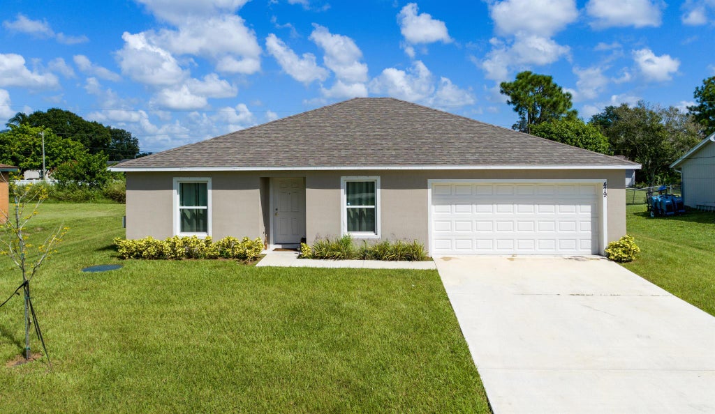 Photo of 479 SW Holden Terrace, Port St Lucie, FL 34984 (MLS # R10914581)