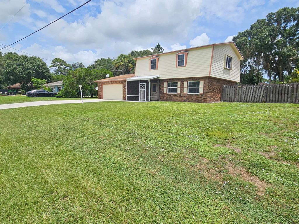 Photo of 3208 Memory Lane, Fort Pierce, FL 34981 (MLS # R11114541)