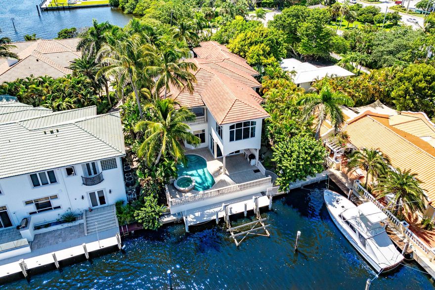 Introducing A Crown Jewel Waterfront Mediterranean Estate an unparalleled masterpiece of elegance and seclusion. This exclusive residence, boast 55ft of prime water frontage on an oversized 90ft canal (2x a standard size canal width) with direct access to the main intracostal immediately after leaving your private dock. Nestled within a tranquil cul-de-sac in the prestigious Rio Delray community, offers a private sanctuary behind its own gated entrance. Presenting a stately and magnificent six-bedroom residence, a true European-inspired masterpiece spanning 7,307 +/- square feet, crafted to fulfill the desires of the distinguished South Florida lifestyle.Designed and built with masterful precision by Garcia Brenner Stromberg and Millennium Builders, this estate is adorned with