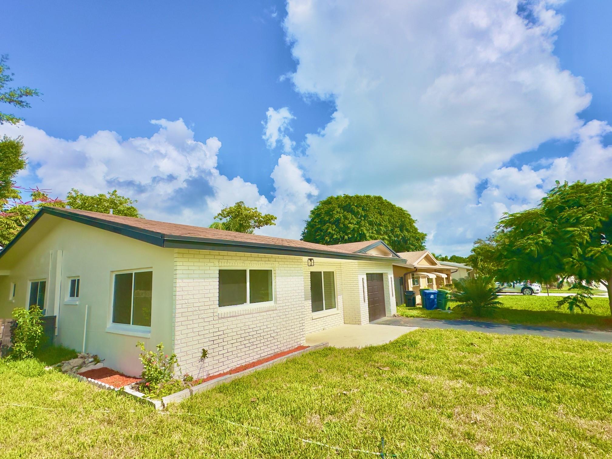 Fully Renovated 3 Bed 2 Bath Lakefront Home in sought after Palm Aire! This Move-in ready 1car garage home sits on a large lake with stunning views. Upgrades include new impact windows/doors, brand new landscaping, new porcelain tiles and luxury vinyl plank flooring throughout. Brand new kitchen/appliances, brand new bathrooms, Electrical and impact garage door! Enjoy new recessed lighting, new interior and exterior paint, and a brand new full AC system for year-round comfort. Open layout offers modern style and functionality, perfect for everyday living or entertaining. Step into your backyard with peaceful lake views—ideal for relaxing mornings or sunset evenings. Centrally located near shops, highways, entertainment and hospitals. Don’t miss this rare lakefront gem Palm Aire Call today!