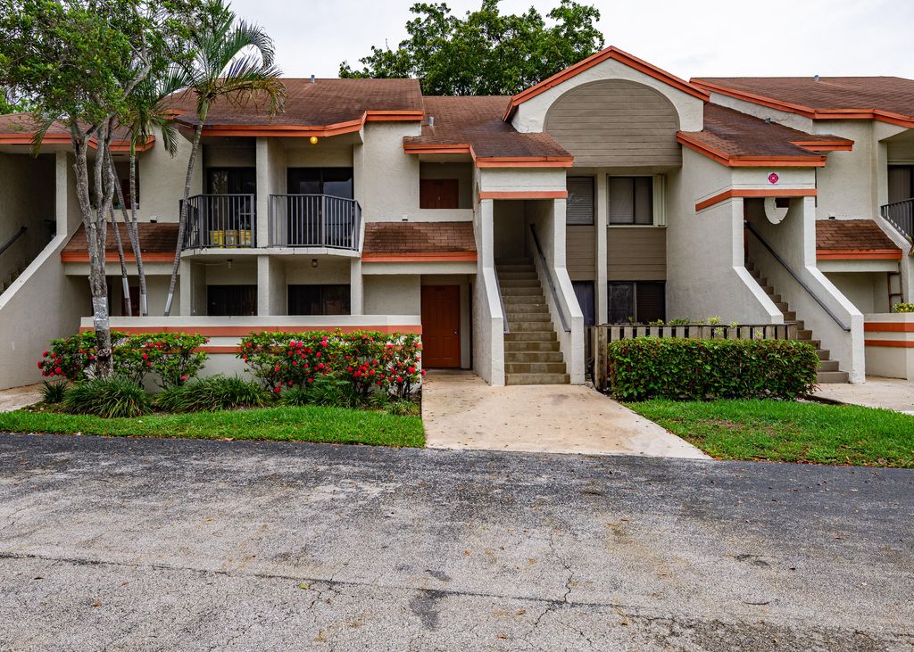 Photo of 5590 Courtyard Drive, Margate, FL 33063 (MLS # R11096519)