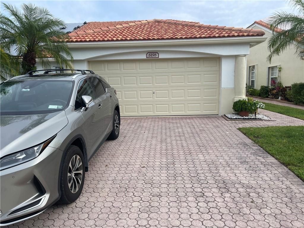 Photo of 6198 Caladium Rd, Delray Beach, FL 33484 (MLS # F10381767)