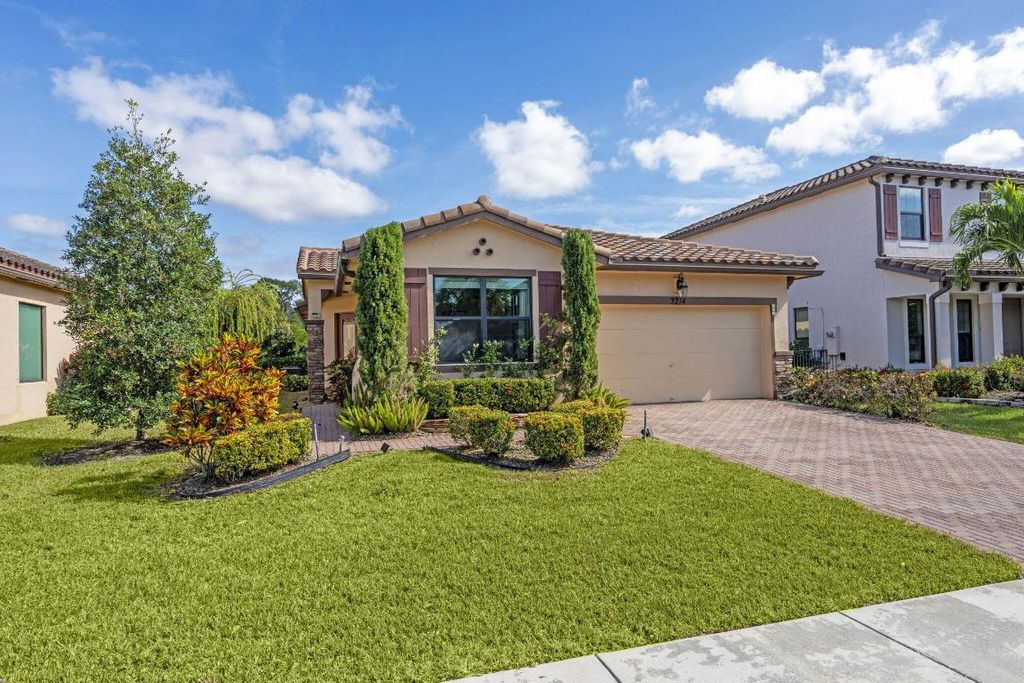 Photo of 3214 Dunning Drive, Royal Palm Beach, FL 33411 (MLS # R11140242)