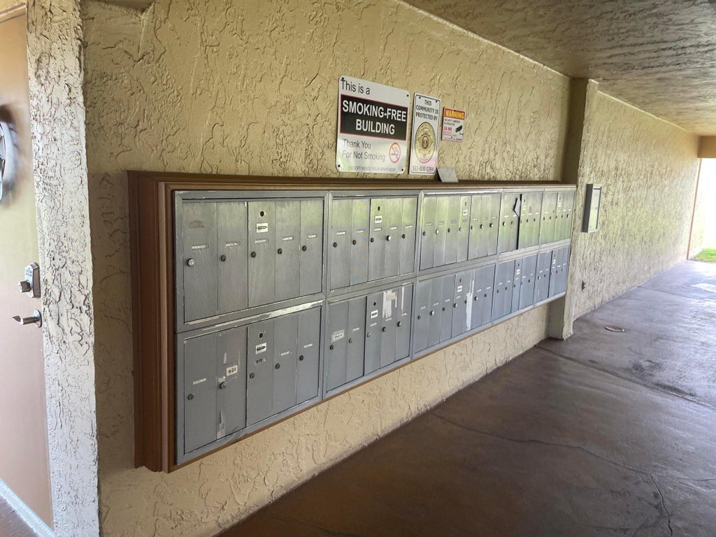 Photo of 700 Village Green Court #208, Palm Springs, FL 33461 (MLS # B26089780)