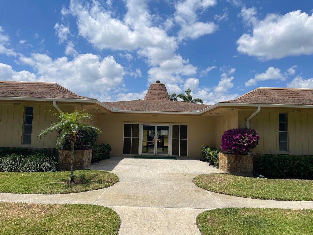 Photo of 700 Village Green Court #208, Palm Springs, FL 33461 (MLS # B26089780)