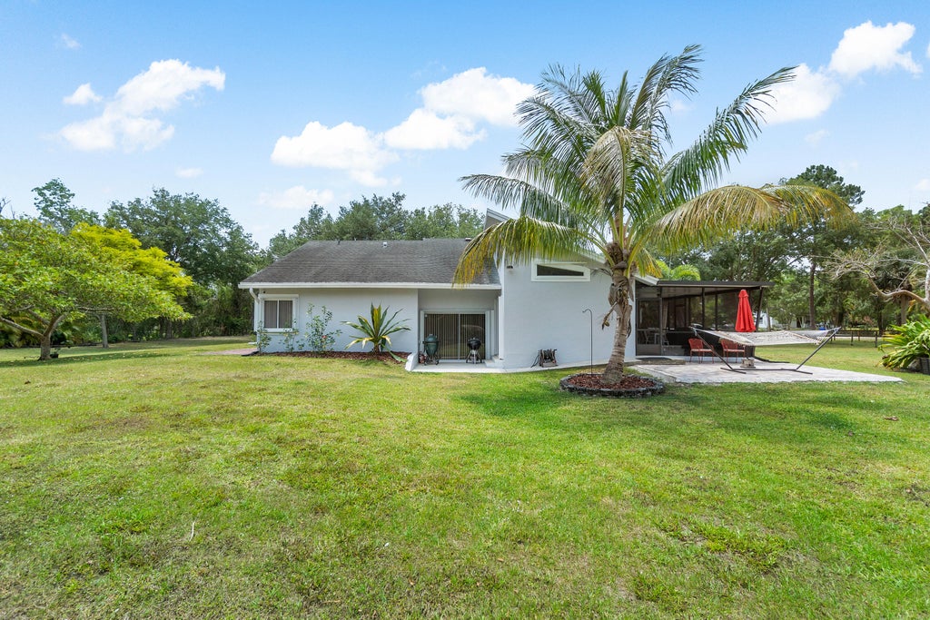 Photo of 16243 E Aintree Drive, Loxahatchee, FL 33470 (MLS # R10981666)