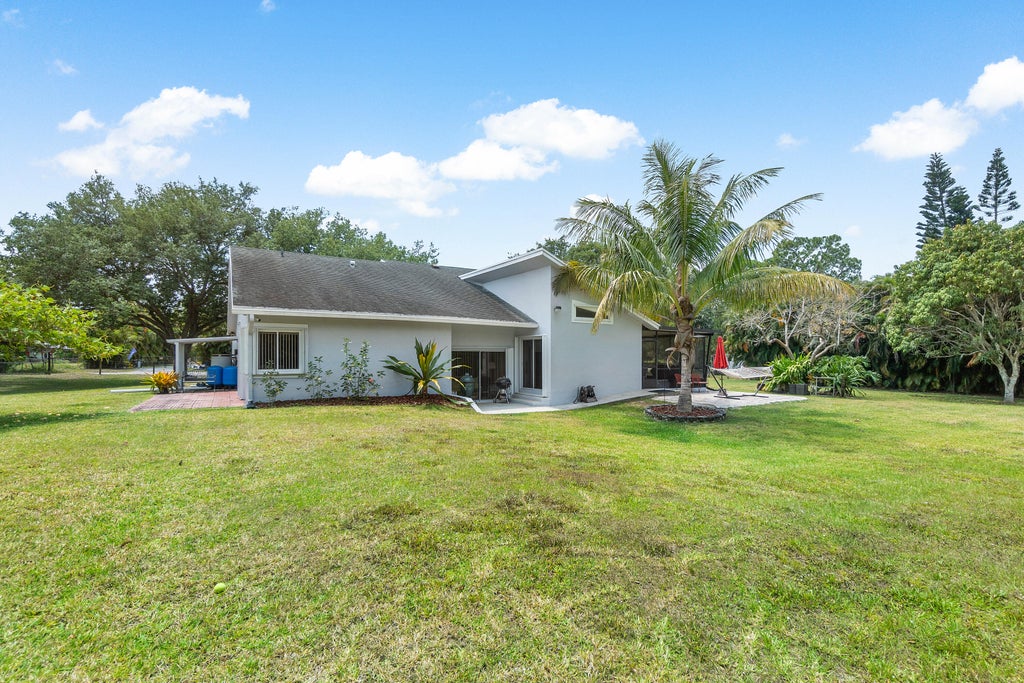 Photo of 16243 E Aintree Drive, Loxahatchee, FL 33470 (MLS # R10981666)