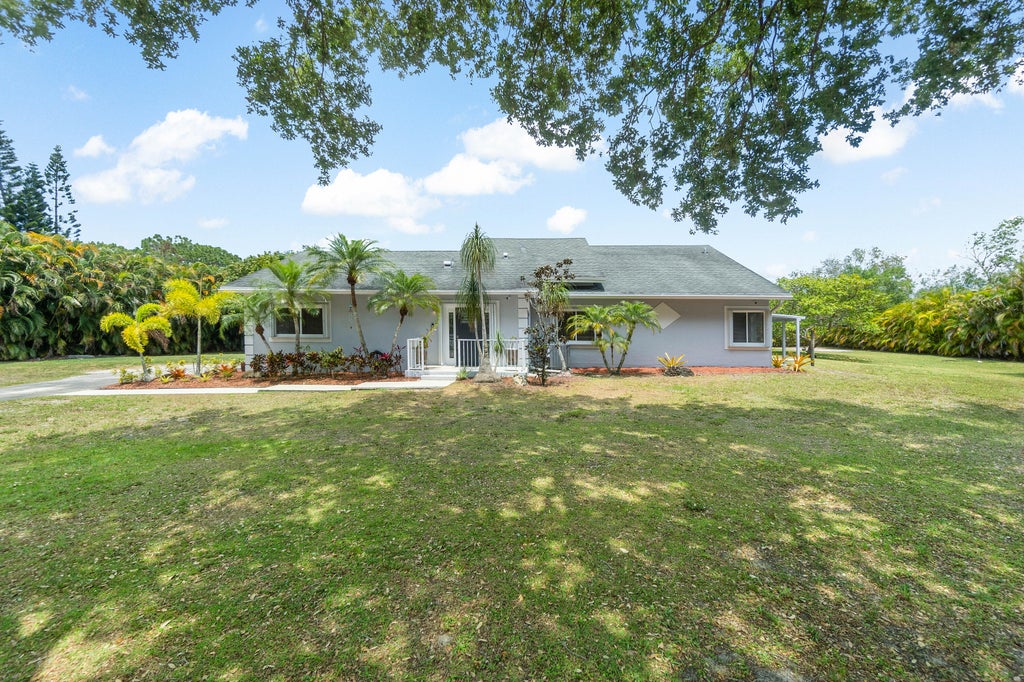 Photo of 16243 E Aintree Drive, Loxahatchee, FL 33470 (MLS # R10981666)