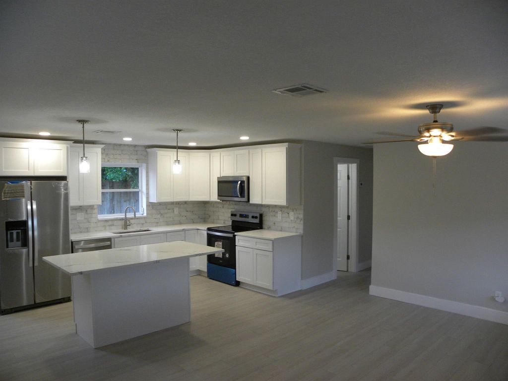Photo of 3121 NE Spruce Ridge Drive, Jensen Beach, FL 34957 (MLS # R11009259)