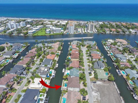 Photo of 945 Cypress Drive, Delray Beach, FL 33483 (MLS # B26033980)