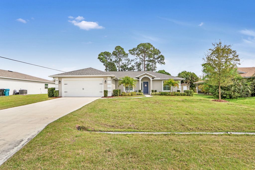 Photo of 1771 SW Erie Street, Port Saint Lucie, FL 34953 (MLS # R10965549)