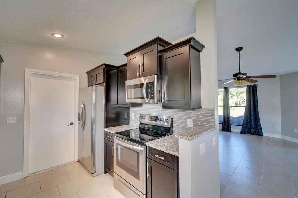 Photo of 1686 SW Cecelia Lane, Port Saint Lucie, FL 34953 (MLS # R10733471)