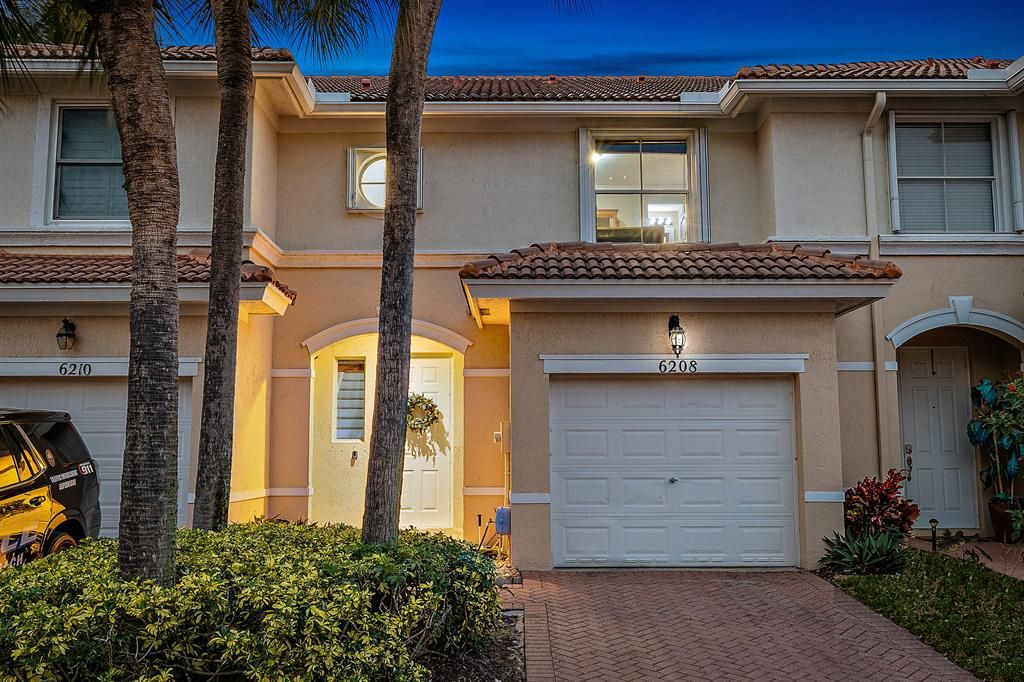 Photo of 6208 Seminole Gardens Circle, Riviera Beach, FL 33418 (MLS # R10860695)