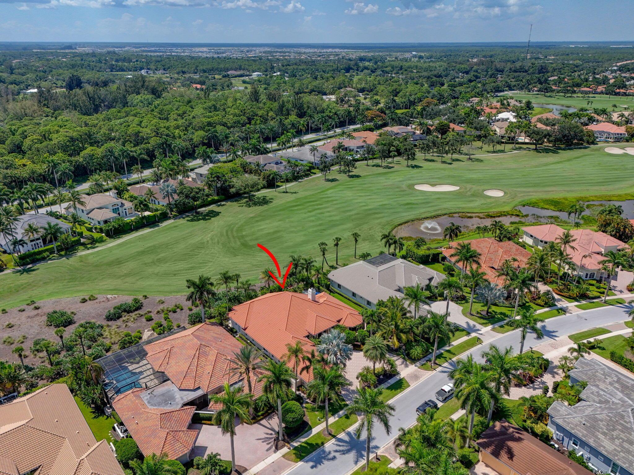 Welcome home! This estate property is situated on a 1/3rd acre lot overlooking the 4th fairway of the Legend golf course. The circular driveway leads you to a stately entrance with double wood paneled glass doors. Upon entering this super bright custom home, the Saturnia marble floors flow throughout the living areas. Tons of natural light due to the abundance of windows, creates a very open and airy feeling. Split floorplan places the primary bedroom and office (with updated flooring and functional built-in) just off the living room (with gas fireplace), and the 3 guest bedrooms (all with private baths) on the south end of the house. A true chef's kitchen with tons of counter space, lots of cabinets, natural gas and upgraded appliances, along with a wet bar. The adjacent family...(MORE)