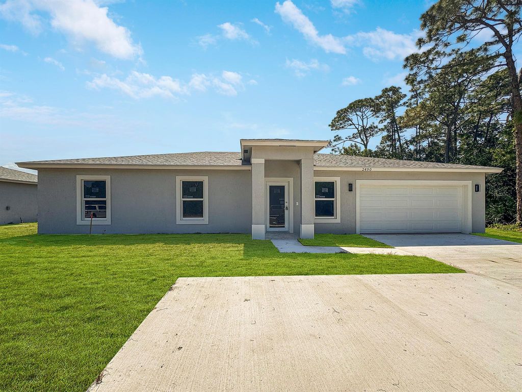 Photo of 2490 SW Bayshore Boulevard, Port Saint Lucie, FL 34984 (MLS # R10979896)