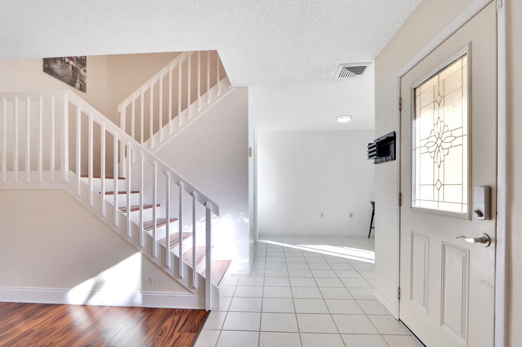 Photo of 5633 SE Windsong Lane, Stuart, FL 34997 (MLS # R10968317)