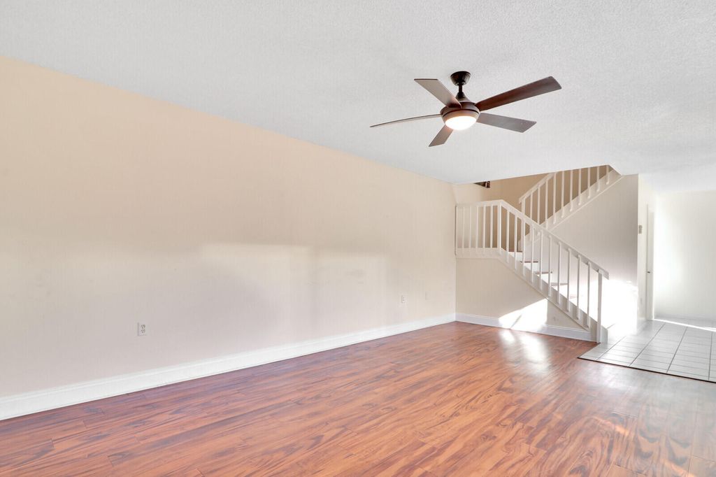 Photo of 5633 SE Windsong Lane, Stuart, FL 34997 (MLS # R10968317)