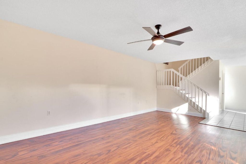 Photo of 5633 SE Windsong Lane, Stuart, FL 34997 (MLS # R10968317)