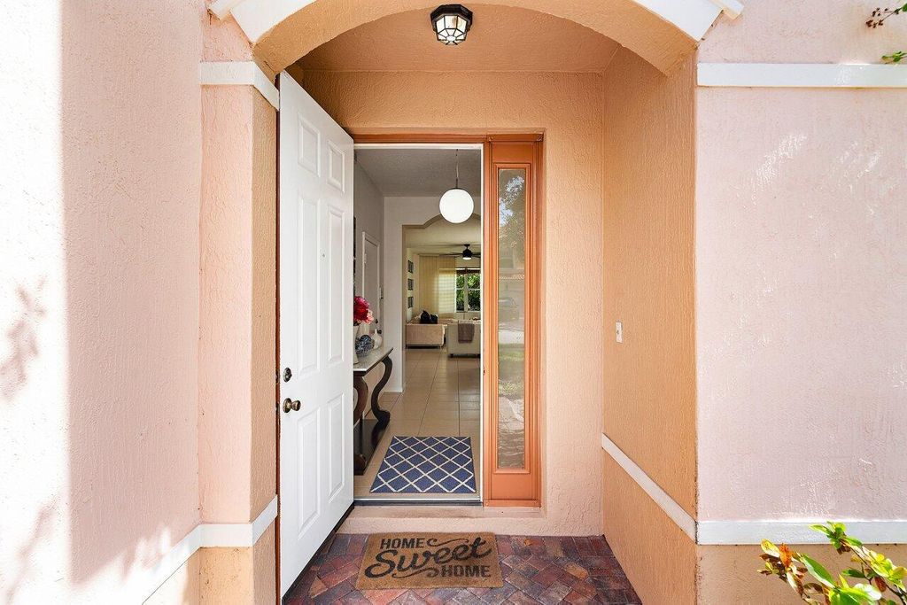 Photo of 1610 Seminole Palms Drive, Greenacres, FL 33463 (MLS # R11095989)