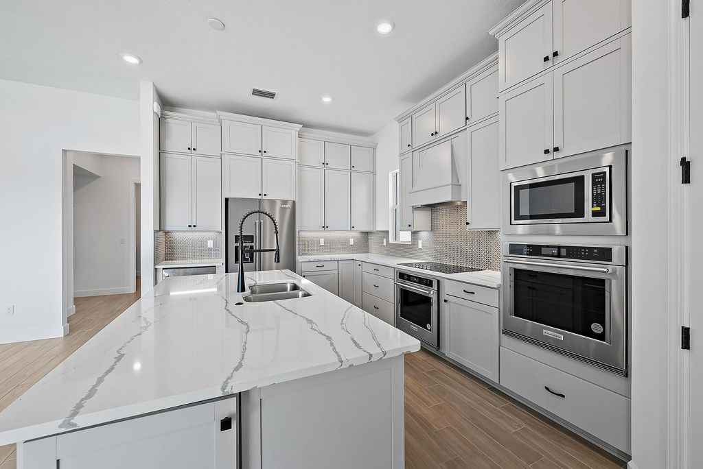 Photo of 9801 SW Legacy Drive, Stuart, FL 34997 (MLS # R11074779)