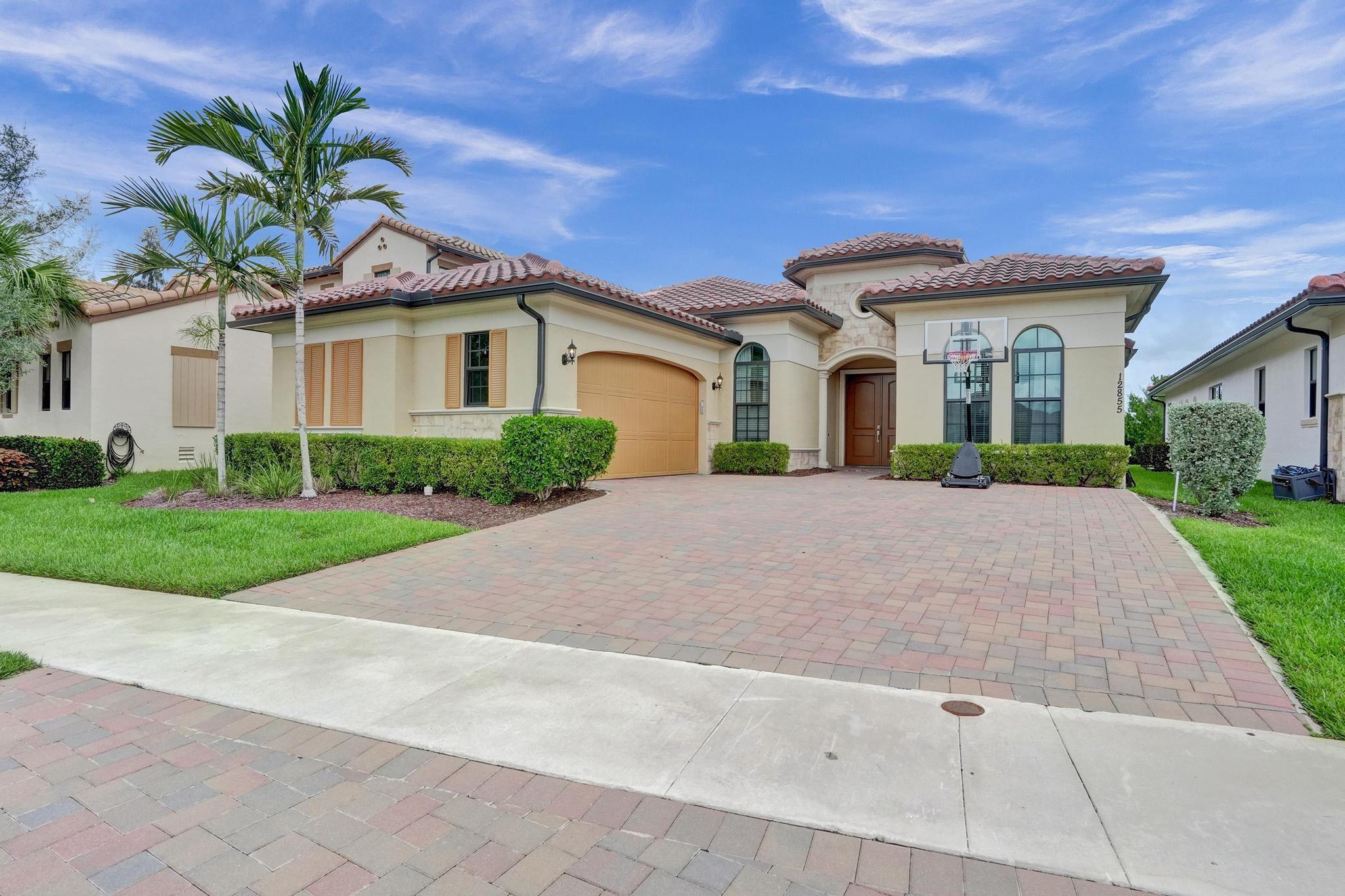 Newer Construction Parkland Bay 4 Bed, 3 Bath one story Hibiscus Model in a cul-de-sac. The Great Room, Kitchen and breakfast area share a flowing layout that helps maximize the footprint of the interior of this estate home, while a formal dining room/study complements the open floorplan. Relax and entertain in your private yard that overlooks the preserve. This living experience community with resort style amenities, features a 16000 sq ft. clubhouse with a fitness center, kids room, banquet rooms, bar, culinary studio, massage rooms, large beach entry pool overlooking the lake, tennis and basketball courts as well as a tot lot.