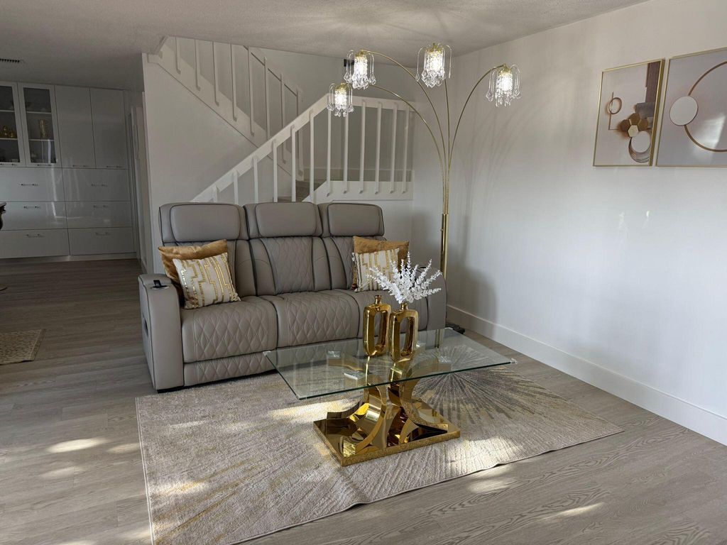 Photo of 21 Lake Arbor Drive, Palm Springs, FL 33461 (MLS # B26022131)