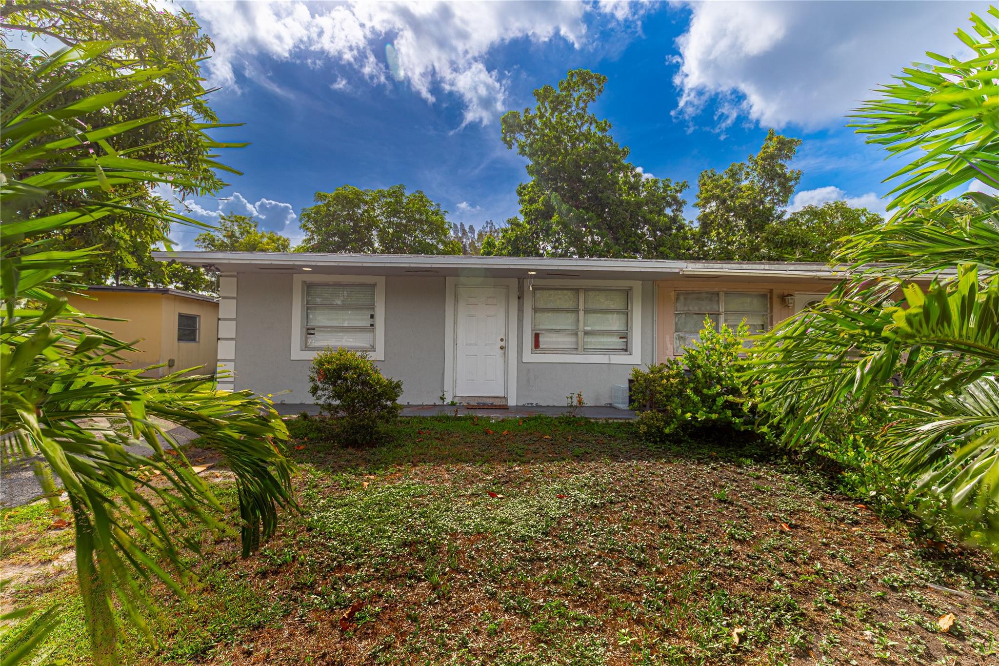 No HOA. No drama. Just freedom. This upgraded 3-bed, 1-bath townhouse includes an in-law suite in the back—perfect for extra income, a home office, or easily converted back into a 3rd bedroom. Prime location just 5 minutes from the Turnpike for an easy commute. Seller is installing brand NEW hurricane-impact windows, so you're storm-ready and energy efficient. Tons of updates already done—just move in and start living. Whether you're house hacking, investing, or buying your first home, this one delivers BIG on value. Act fast—opportunities like this don’t last!