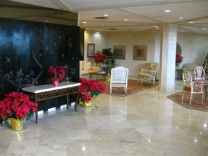 DUNE DECK OF THE PALM BEACHES CONDO - Residential Lease