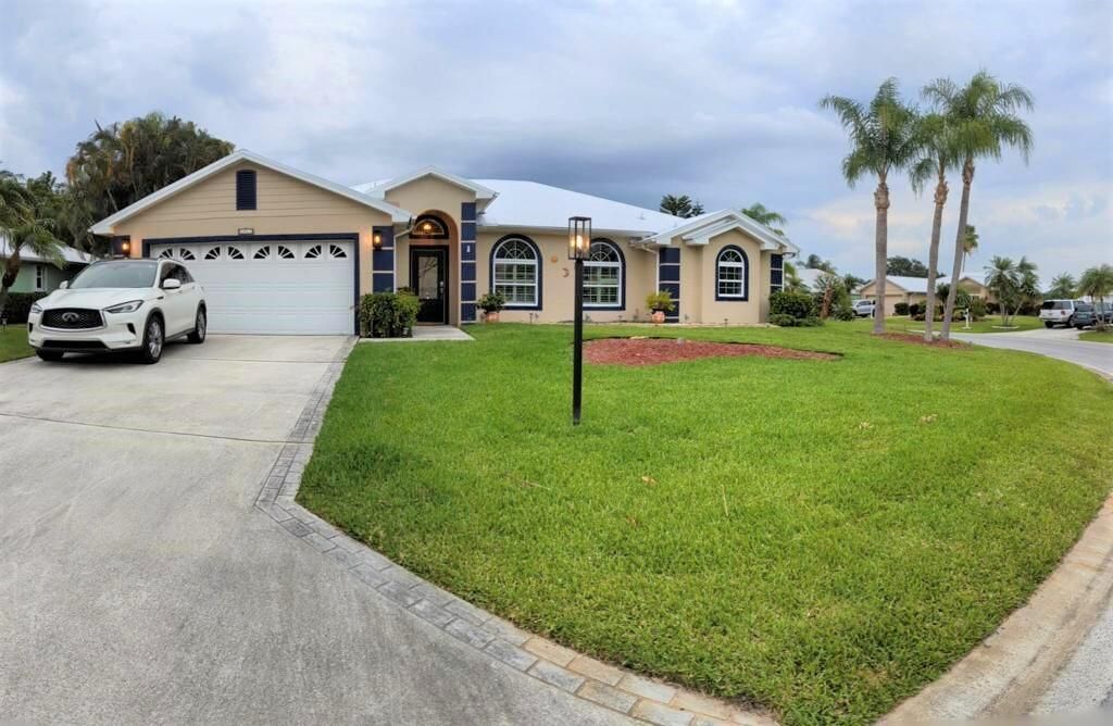 Photo of 6861 Bronte Circle Cir, Port Saint Lucie, FL 34952 (MLS # R10813285)