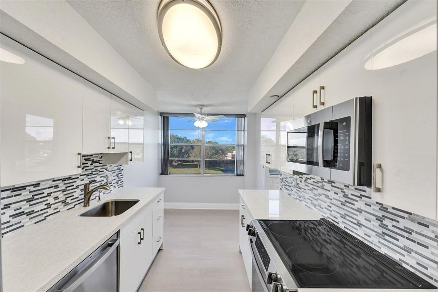 This is your chance to own a rarely available, spacious corner unit in The Elm at Park Place! One of the largest models, this 2-bedroom, 2-bath condo offers spectacular 180° views of the golf course, lake and pool. Inside, you’ll find brand new flooring, brand new stainless steel appliances, a fully remodeled kitchen featuring quartz countertops, and a remodeled bathroom. Perfectly situated, close to the clubhouse and the community’s largest pool, this gated community offers resort-style amenities, including 4 pools, tennis courts, a leisure park, and 24-hour security. NO SPECIAL ASSESSMENTS — just move in and enjoy!Driving Directions: