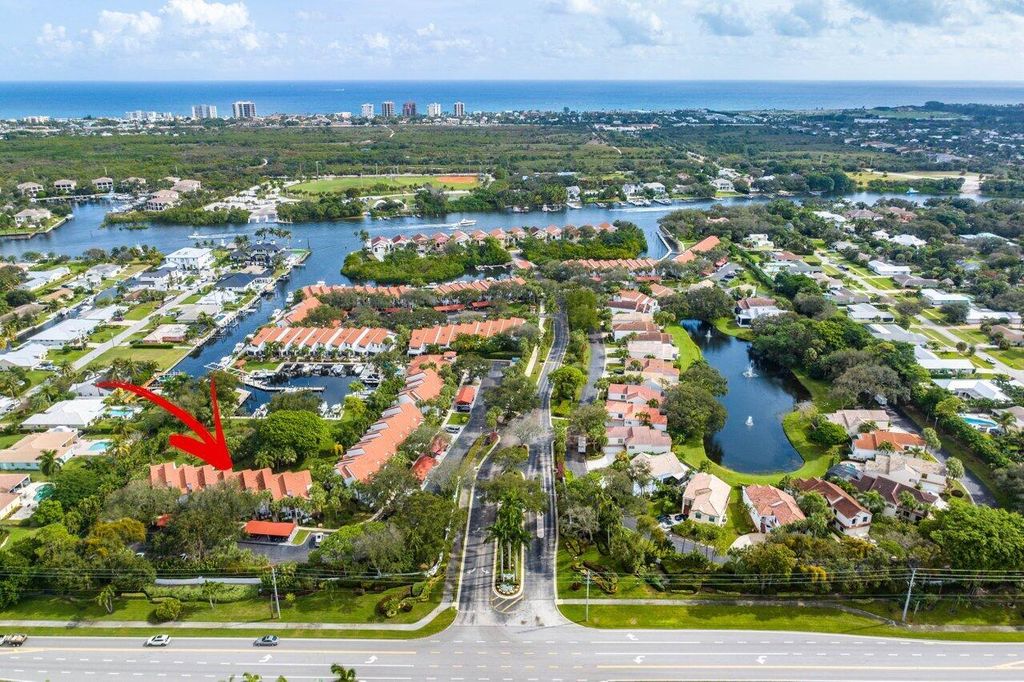 Photo of 2439 Treasure Isle Dr #6 + Dock 14, Palm Beach Gardens, FL 33410 (MLS # R10940447)