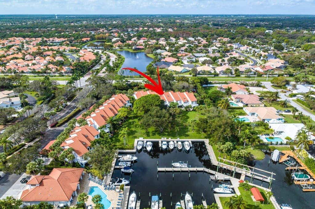 Photo of 2439 Treasure Isle Dr #6 + Dock 14, Palm Beach Gardens, FL 33410 (MLS # R10940447)