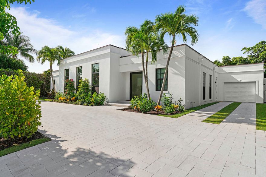 240 Sandpiper Drive has been meticulously renovated with the finest contemporary finishes while preserving the grand scale of a classic Gottfried Regency home. The open floor plan and 12' ceilings make for effortless indoor-outdoor entraining. The chef's kitchen is complete with Quartz countertops, Brazilian Quartzite Island, custom cabinetry and Miele appliances. This 4 bedroom, 4 bathroom, and 1 half bathroom residence is expertly crafted with impact windows, a 5-zone A/C system, security cameras, and Wifi allowing convenience at the tap of a button. 

A wall of glass sliding doors lead to a large swimming pool, and patio. 240 Sandpiper is located on one of the most desirable streets in the North End of Palm Beach and comes with deeded beach access.