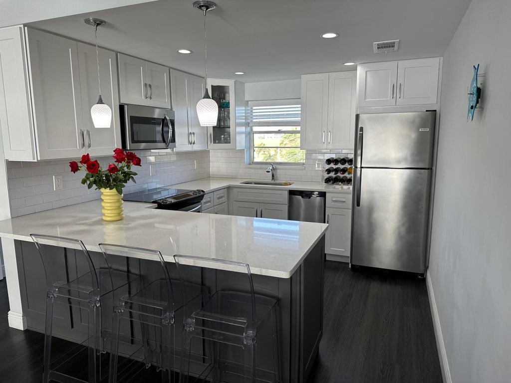 Photo of 52 Yacht Club Drive #402, North Palm Beach, FL 33408 (MLS # R10971715)