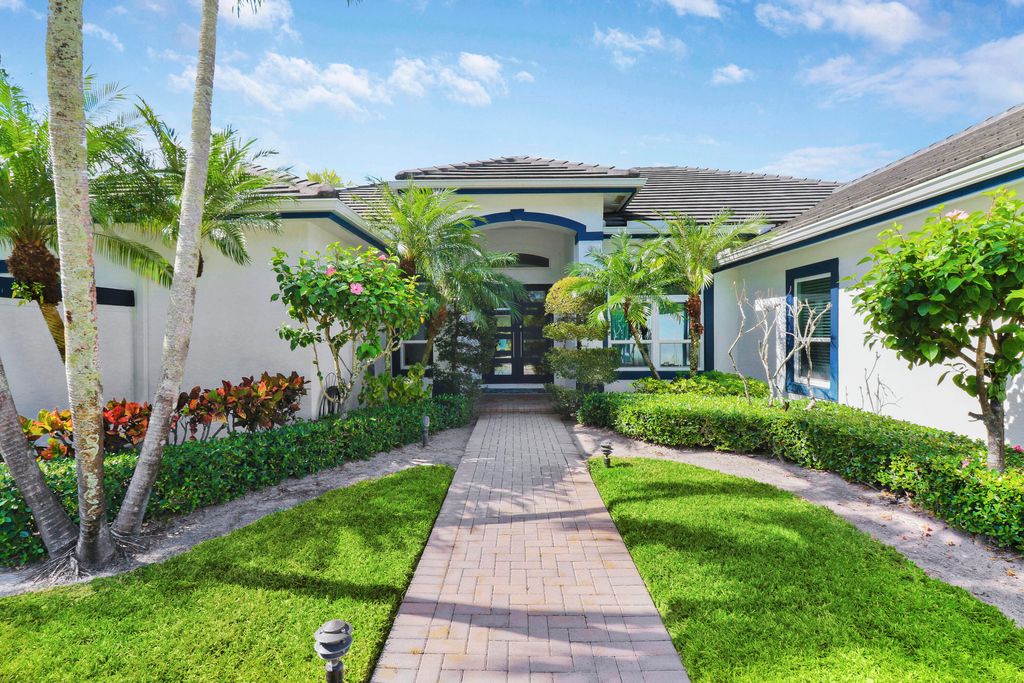 Photo of 8369 Man O War Road, Palm Beach Gardens, FL 33418 (MLS # R10971945)