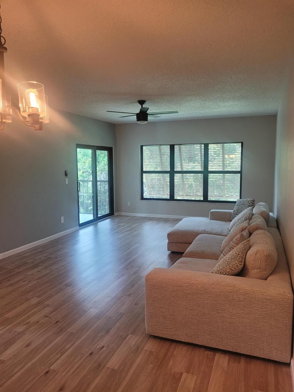Newly renovated 2/2 in quiet gated community. Large 1322 sqft of living space. Ceiling fans in each room. Screened in covered porch, impact windows/doors, assigned covered parking spot with additional storage. The community has a swimming pool, clubhouse, tennis/ pickleball courts, Kayak/ paddle board storage area, and a boat dock that accomodates up to a 20' boat. Slips are available. Trucks and motorcycles are not allowed in community. No pets. Rent includes basic cable, water, garbage