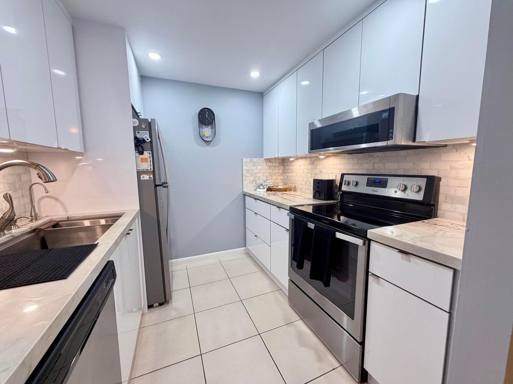 Photo of 150 SW 134TH Way #106R, Pembroke Pines, FL 33027 (MLS # B26068737)
