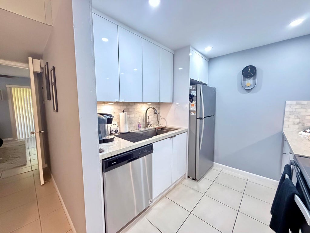 Photo of 150 SW 134TH Way #106R, Pembroke Pines, FL 33027 (MLS # B26068737)