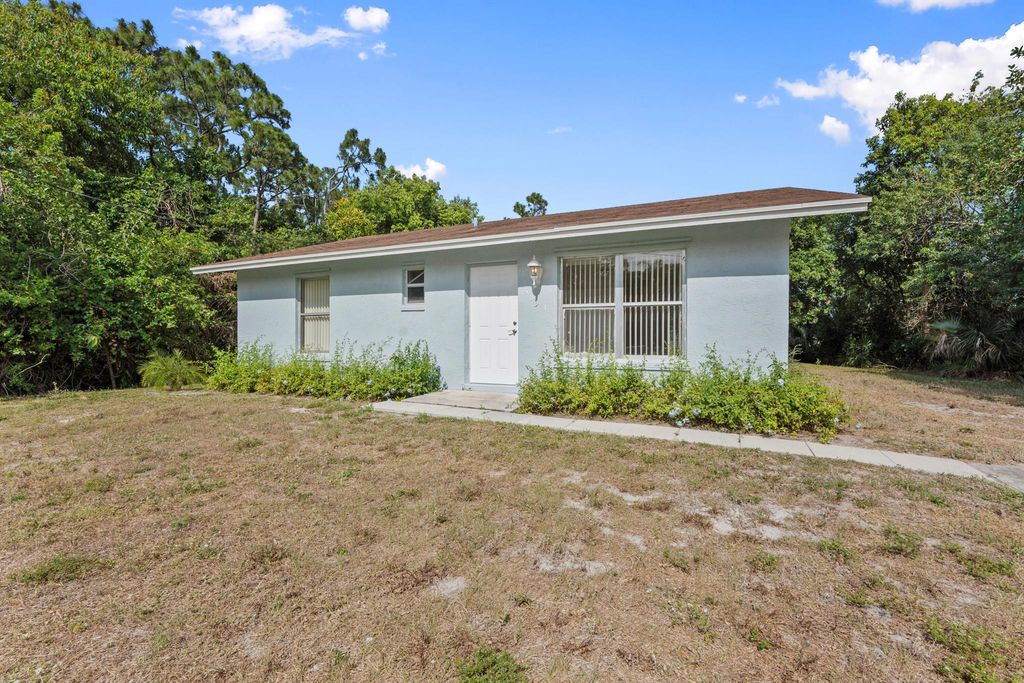 Photo of 5851 SE Wesley Avenue, Stuart, FL 34997 (MLS # R11087816)
