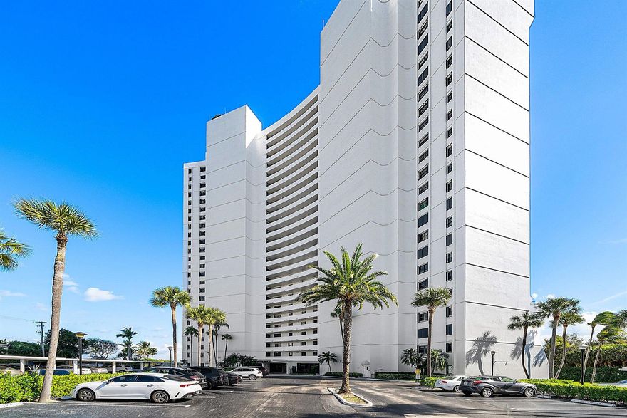 RARE opportunity to own an open concept condo directly on the Intracoastal. As soon as you enter into this condo there are unobstructed water views everywhere! This condo sits directly in the middle of the building giving the best views & the most light this condo community offers. The condo boasts updated kitchen with plenty of storage, updated bathrooms with a bidet in master bathroom, expansive sliders, all windows impact glass, NO Popcorn, Large tile floors, tankless water heater, & includes hurricane shutters on balcony. The center location of this condo allows from more windows & extra light into the home. The primary bedroom has built in shelves, drawers & a vanity. This room also has a private balcony to enjoy the Eastern sunrises in the morning. Built-ins included in all closets.