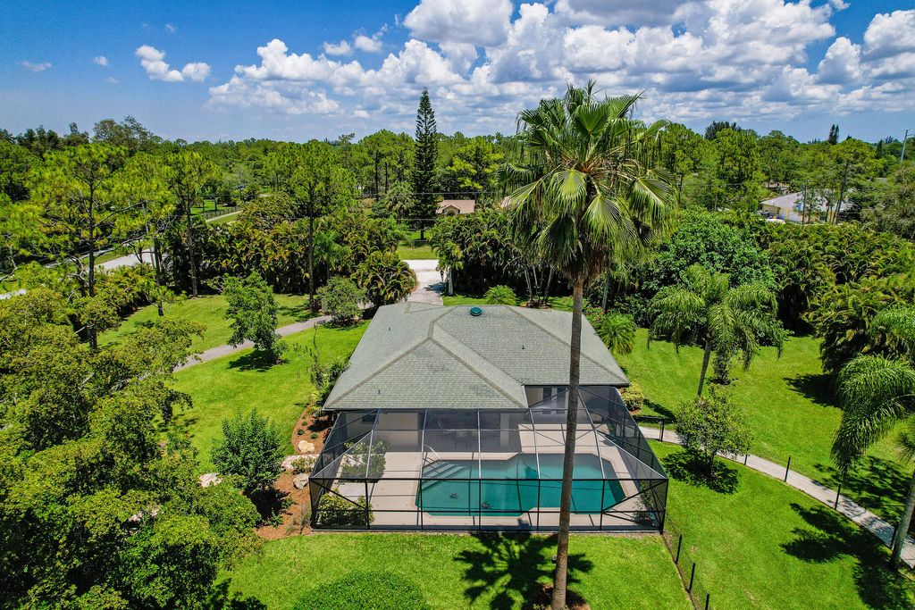 Photo of 16972 W Lancashire Drive, Loxahatchee, FL 33470 (MLS # R10866666)