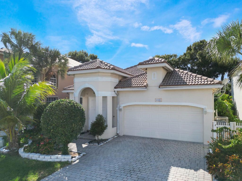 Photo of 6925 Spider Lily Lane, Lake Worth, FL 33462 (MLS # R11133532)
