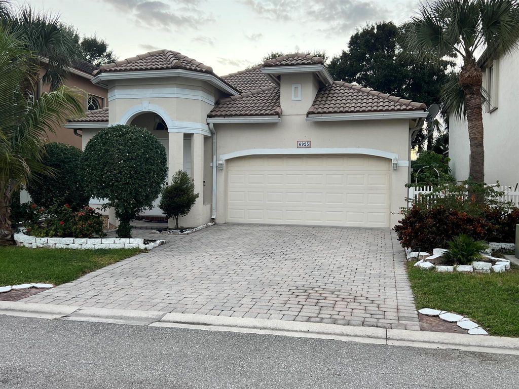 Photo of 6925 Spider Lily Lane, Lake Worth, FL 33462 (MLS # R11133532)