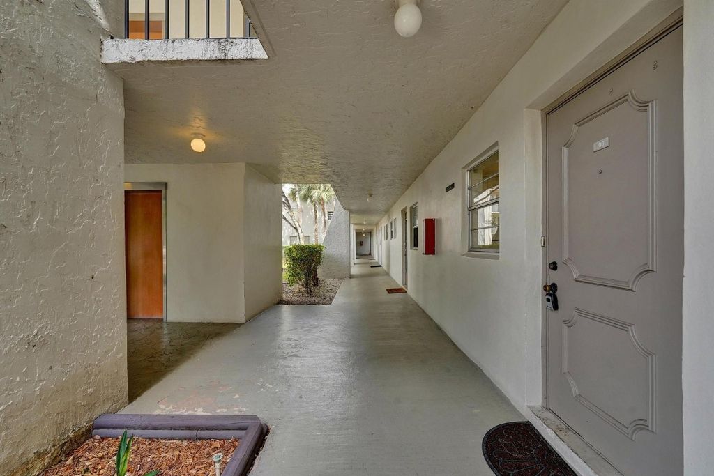 Photo of 9440 Poinciana Place #109, Davie, FL 33324 (MLS # F10523716)